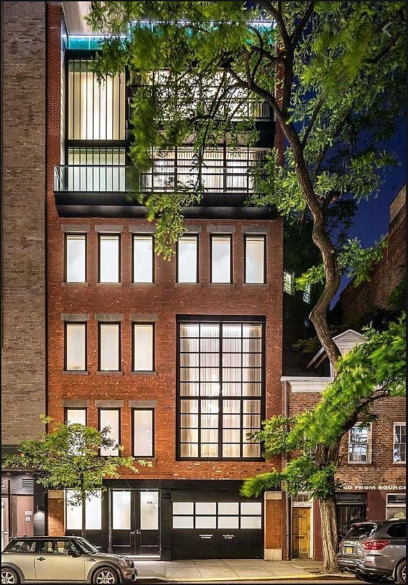 The brick and steel facade of a Tribeca townhouse